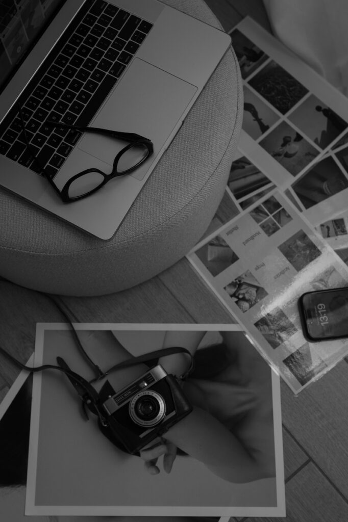 Flatlay with camera and printed images 