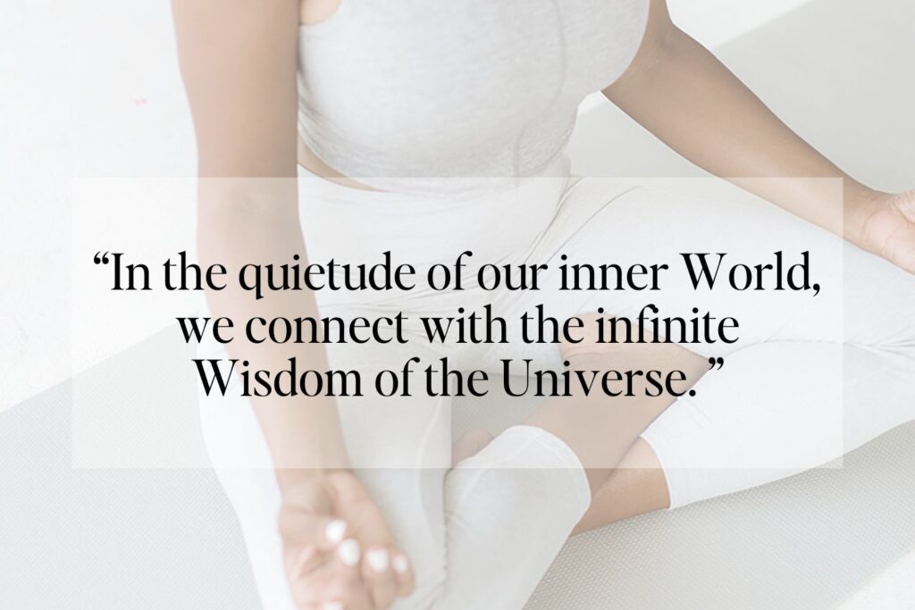 Image of a person in a meditative pose with the quote 'In the quietude of our inner World, we connect with the infinite Wisdom of the Universe.