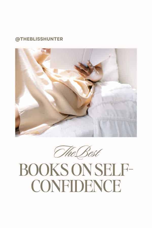A cozy reading nook with golden satin sheets and a person holding a book, with the text 'The Best Books on Confidence' by @THEBLISSHUNTER