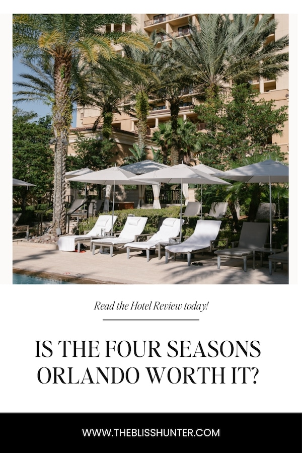 Promotional image for Four Seasons Orlando reviews featuring a poolside setting with loungers and umbrellas.