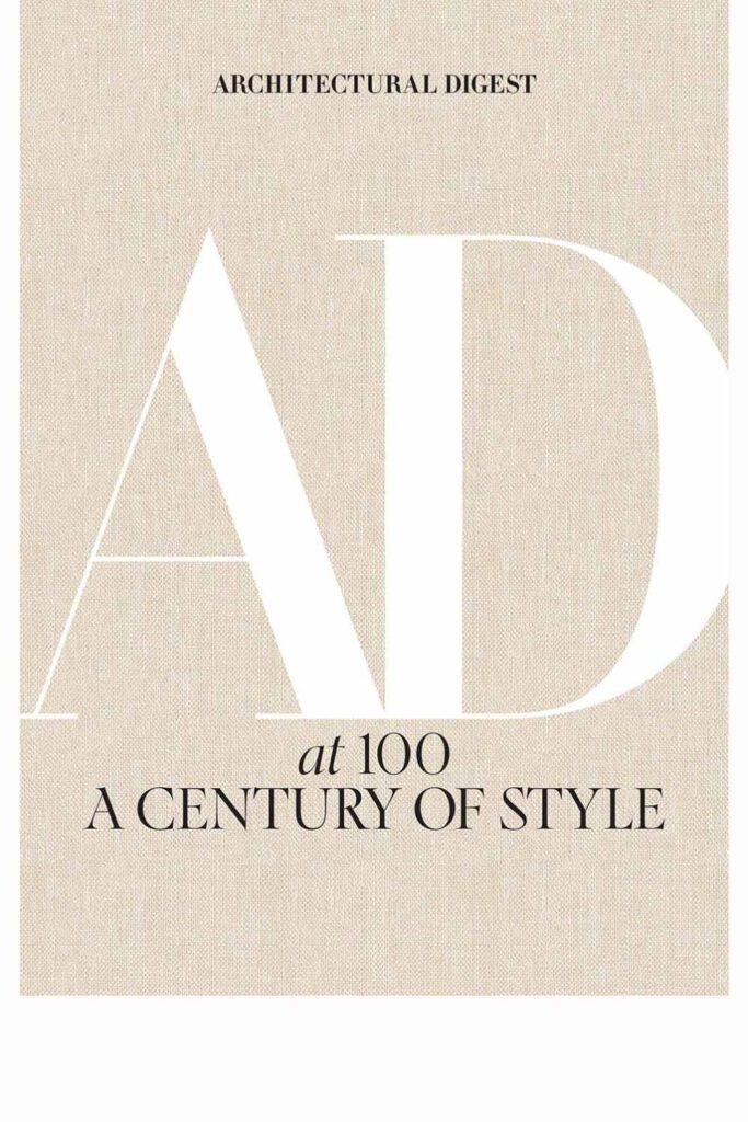 Luxury books: The cover of 'Architectural Digest at 100: A Century of Style' with minimalist design on a textured beige background.