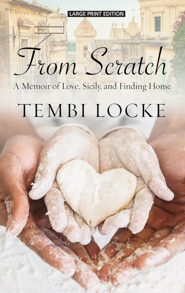 Cover of 'From Scratch: A Memoir of Love, Sicily, and Finding Home' by Tembi Locke, depicting hands holding a heart-shaped piece of dough.