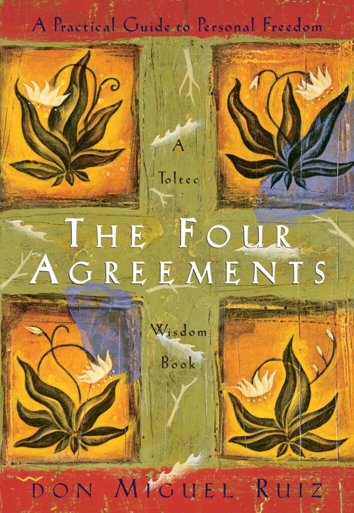 Cover of one of the Best Self-Improvement Books of All Time:'The Four Agreements: A Practical Guide to Personal Freedom' by Don Miguel Ruiz, featuring a vibrant, painted depiction of flowers and a rustic background.