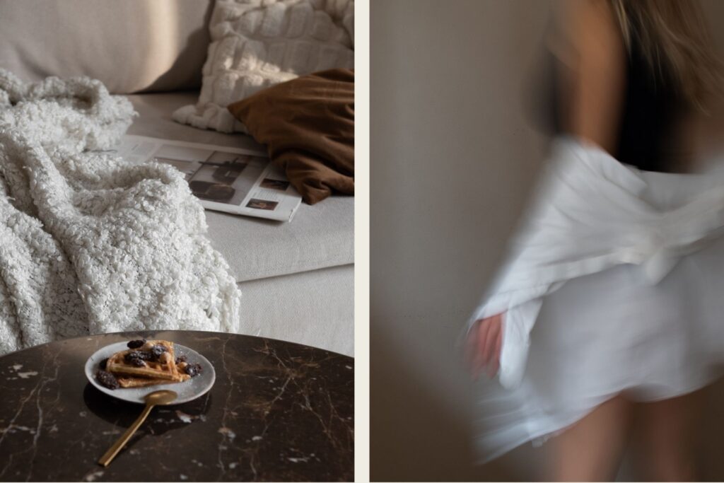 Cozy living room scene with a soft blanket and pastries next to a blurred motion image of a woman in a white shirt, evoking comfort and calm.