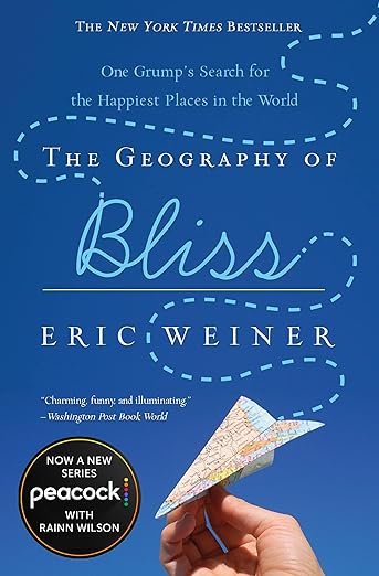 Book cover of 'The Geography of Bliss' by Eric Weiner, featuring a paper airplane soaring over a blue background with dashed flight path lines.