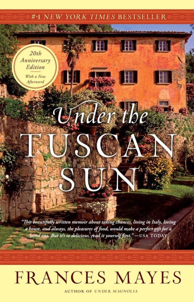 Cover of 'Under the Tuscan Sun' by Frances Mayes, depicting the warm, sunlit façade of a Tuscan villa, inviting readers to a world of Italian romance and renovation.