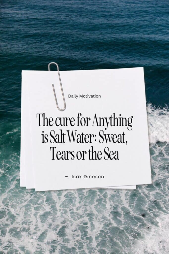 An open notebook with a paperclip against an ocean backdrop, featuring under the sea quote by Isak Dinesen , "The cure for anything is Salt Water: Sweat, Tears or the Sea.