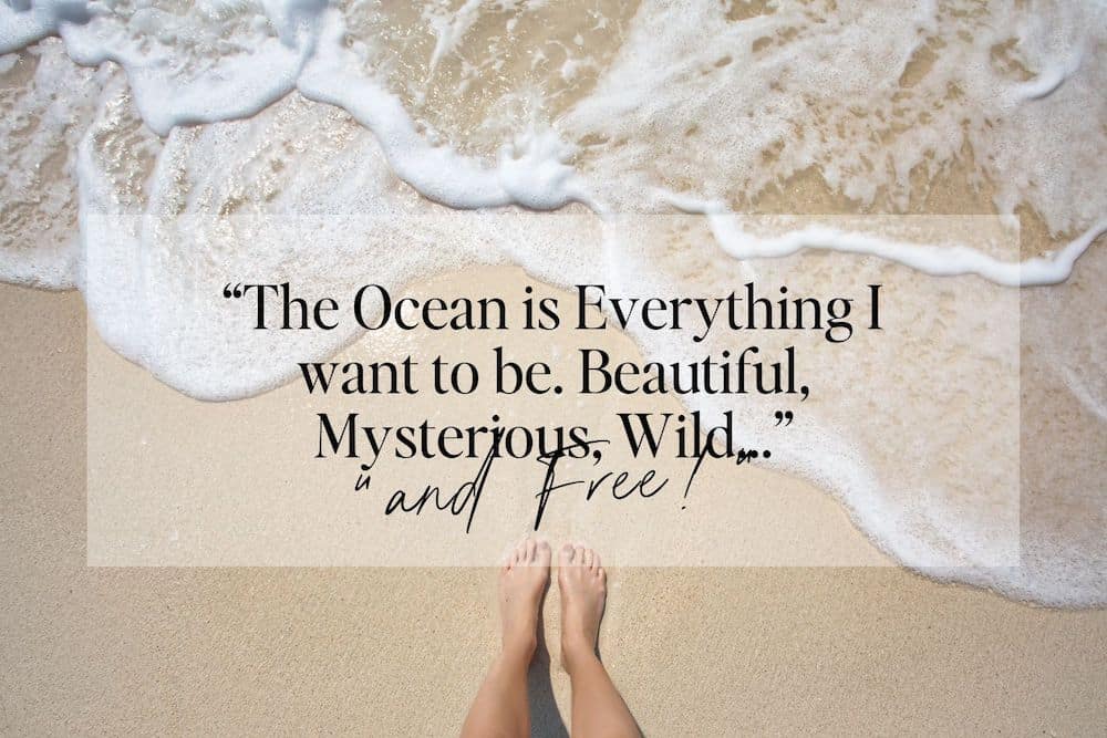 Feet in the sand with the frothy edge of a wave, overlaid with an inspirational quote reflecting the ocean's beauty, perfect for Vitamin Sea quotes for Instagram.